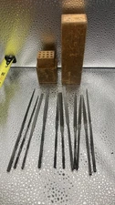Set of (12) needle files in wooden holder