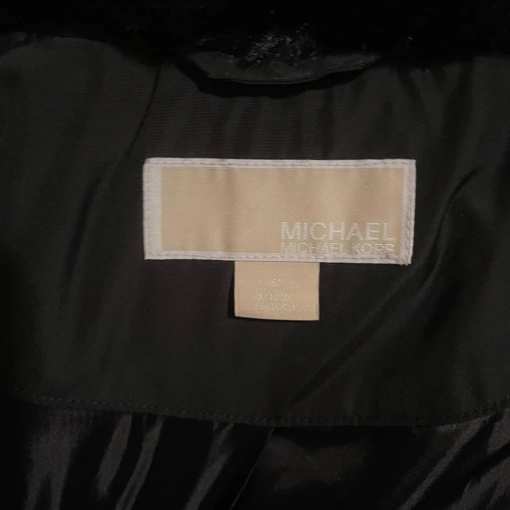 Michael Kors Cappotto laterale cerniera da donna nero con cappuccio nascosto