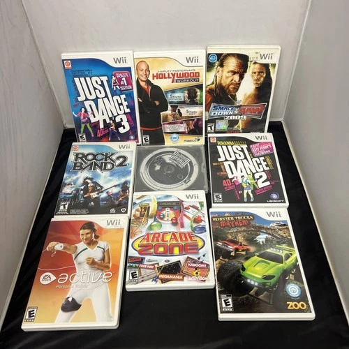 New ListingLot of 9 Nintendo Wii Video Games Rock Band Guitar Hero Just Dance Read