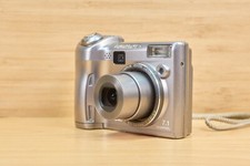 OLYMPUS SP-310 7.1MP Digital Camera, 3x Optical Zoom, Silver