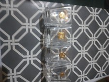 Set of 4 Jack Daniels Gold Medalion shot glasses. 1905,1913,1914 and 1954