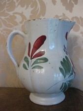 Ancienne carafe en faience   rare signature St Clément  