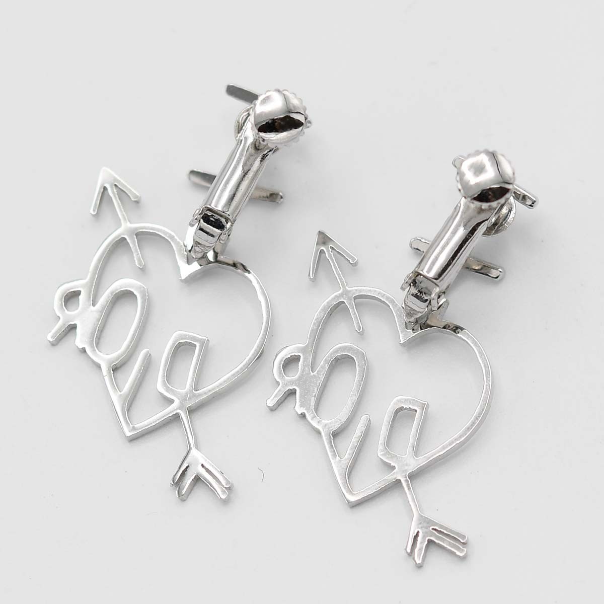 Christian Dior heart arrow silver earrings jewelry accessories