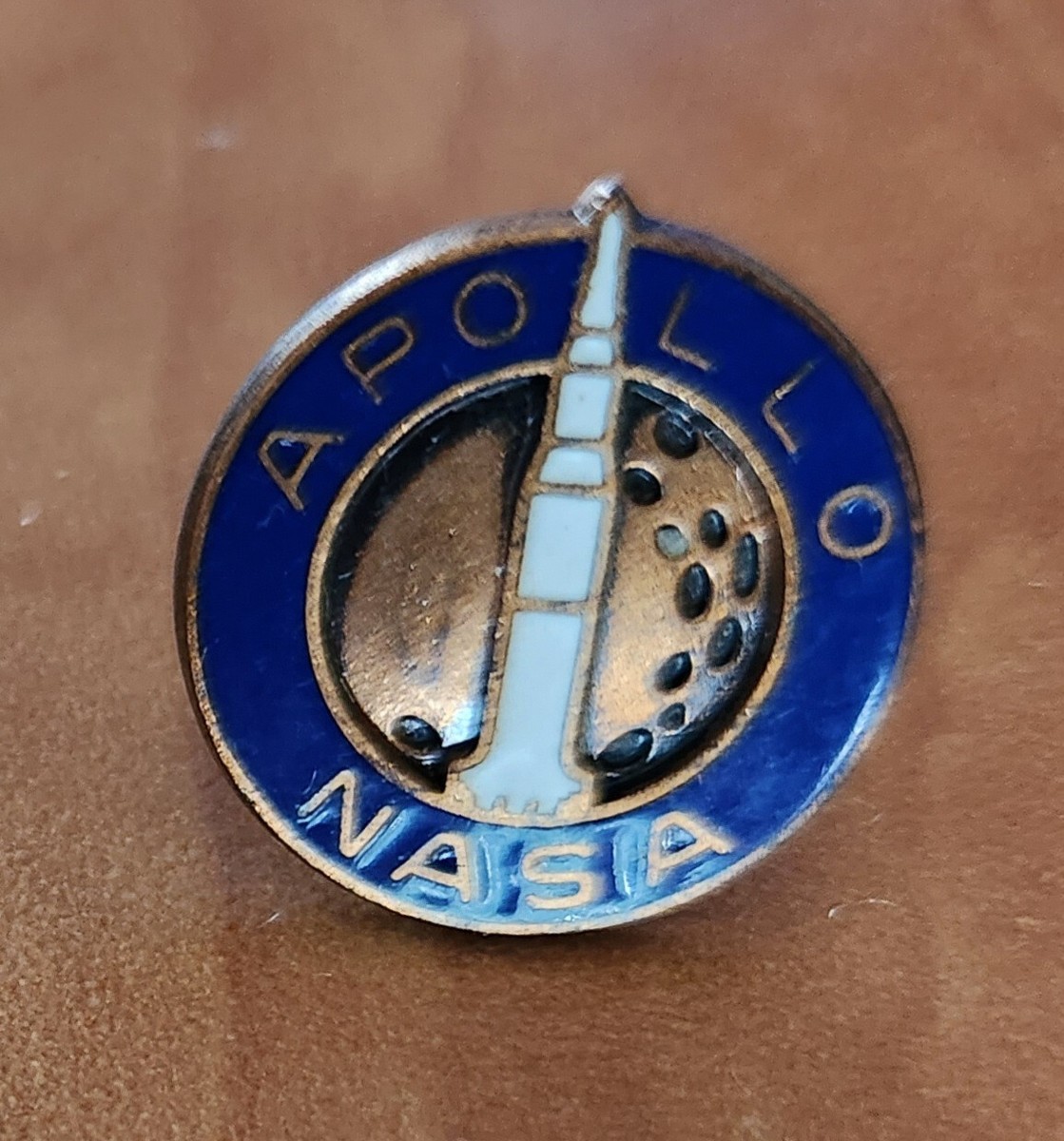 Vintage NASA official Apollo enamel lapel or tie pin, Saturn V