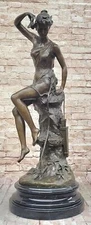 Hot Cast Bronze Figurative Sculpture of a Seated Girl Holding a Flower Art Deco