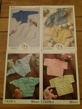 Baby Double Knitting Patterns - 4 different patterns  FREE POSTAGE