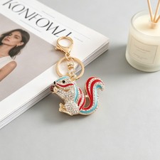Color Stripe Rhinestone Squirrel Holding Pinecone Keychain