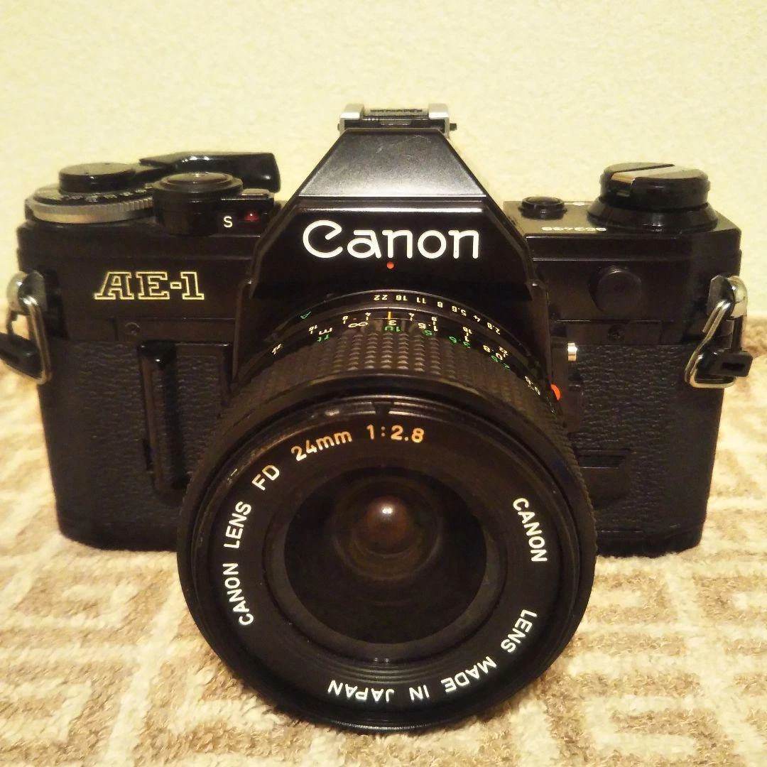 Canon AE-1 black with single focus lens (24mm F2.8) | eBay