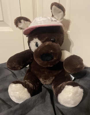 BUILD A BEAR DARK BROWN DOG WITH CREAM EYE PATCH AND PINK HOUSTON ASTROS HAT