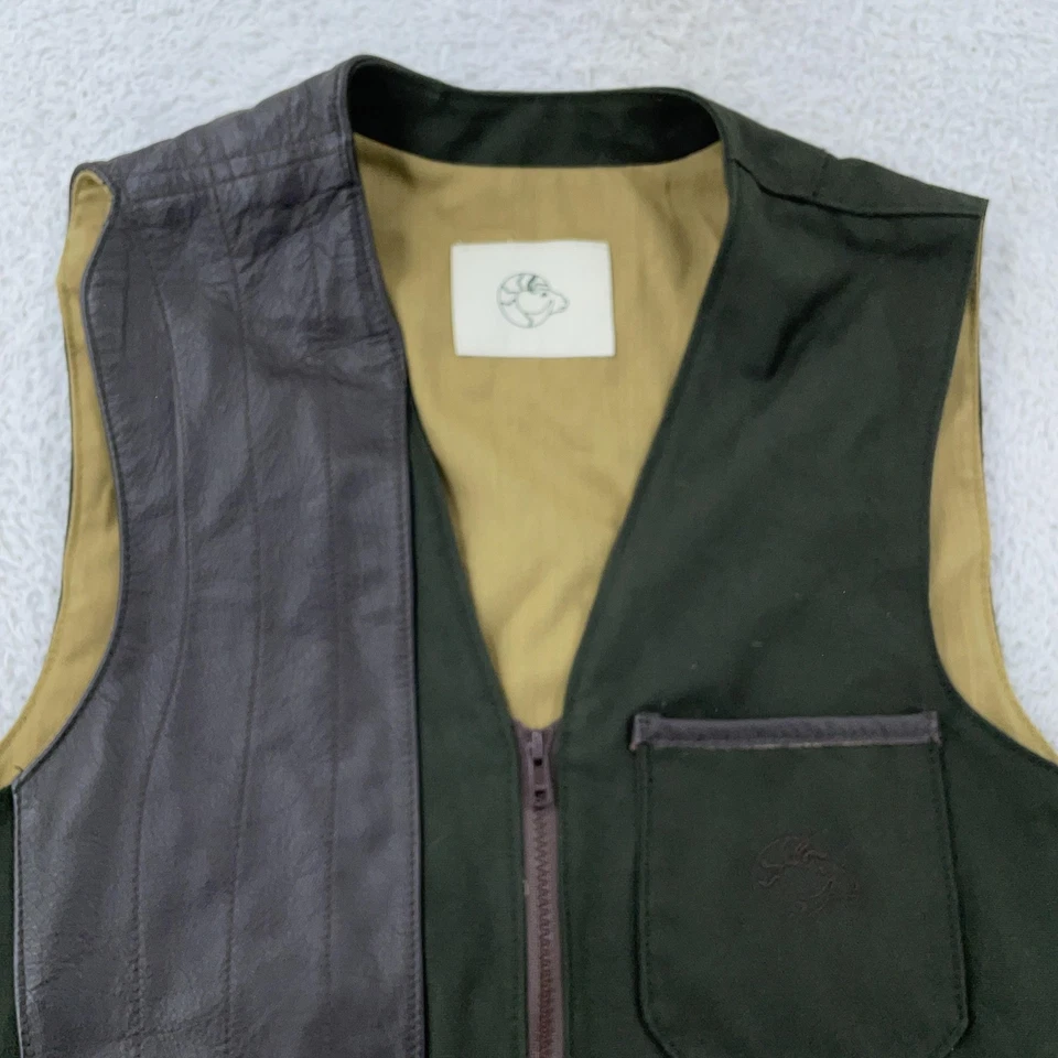 Chaleco de tiro para hombre mediano verde marrón cuero ribete bolsillos con cremallera hecho en Gran Bretaña Foto 2 de 4