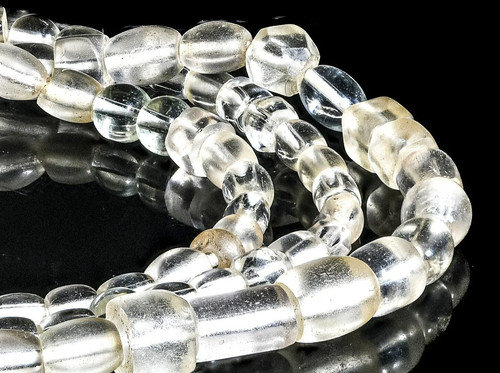 A strand of Antique Bohemian Crystal Clear Mostly Oval African Trade Beads