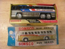 2 VINTAGE TIN BUSES.BOTH IN ORIGINAL PACKAGES.