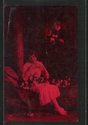 Photo postcard RPH No. 4250/5: Lady on chaise longue, 1916