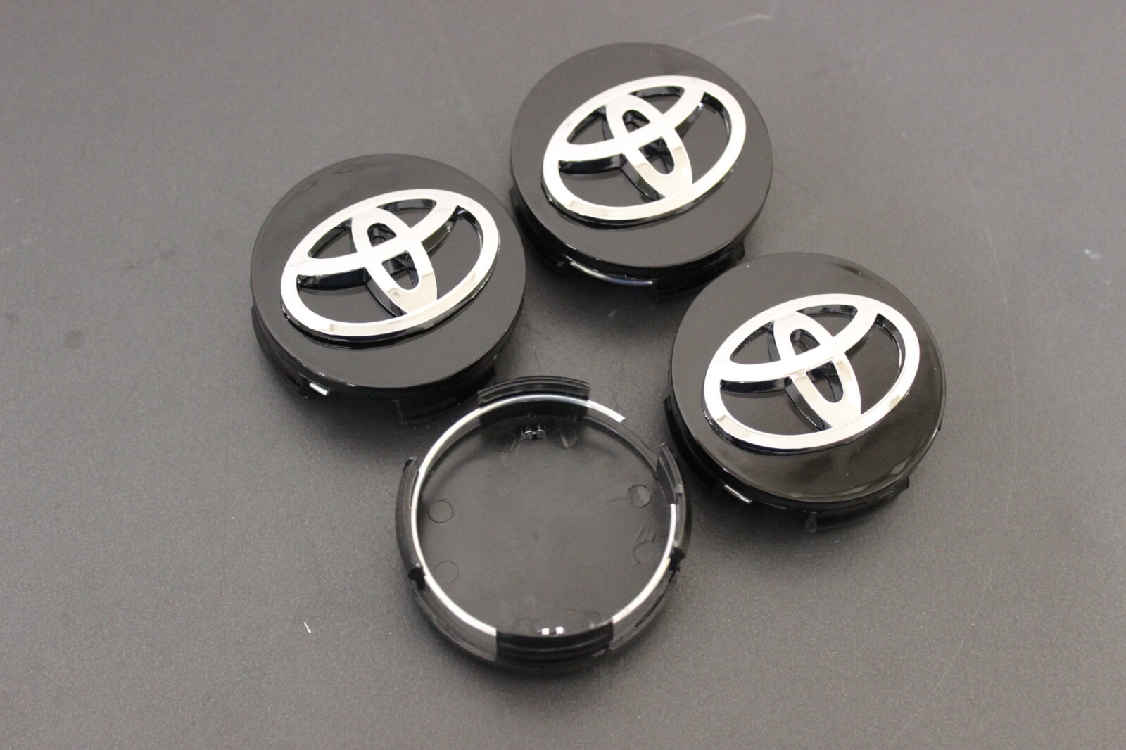 (4) TOYOTA WHEEL RIMS CENTER HUB CAP CAPS BLACK BASE CHROME LOGO 62MM CAMRY