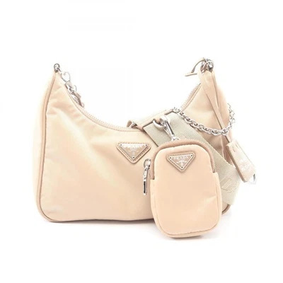 Sac bandoulière PRADA réédition 2005 1BH204 nylon cuir saffiano beige occasion - Photo 1/4