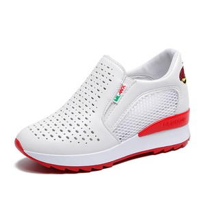 girls pull on trainers