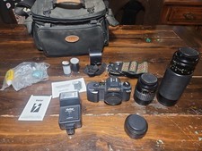 Canon T50 35mm Camera Kit w/ 2 Lenses Flash Bag Powers On Fires Fungus...