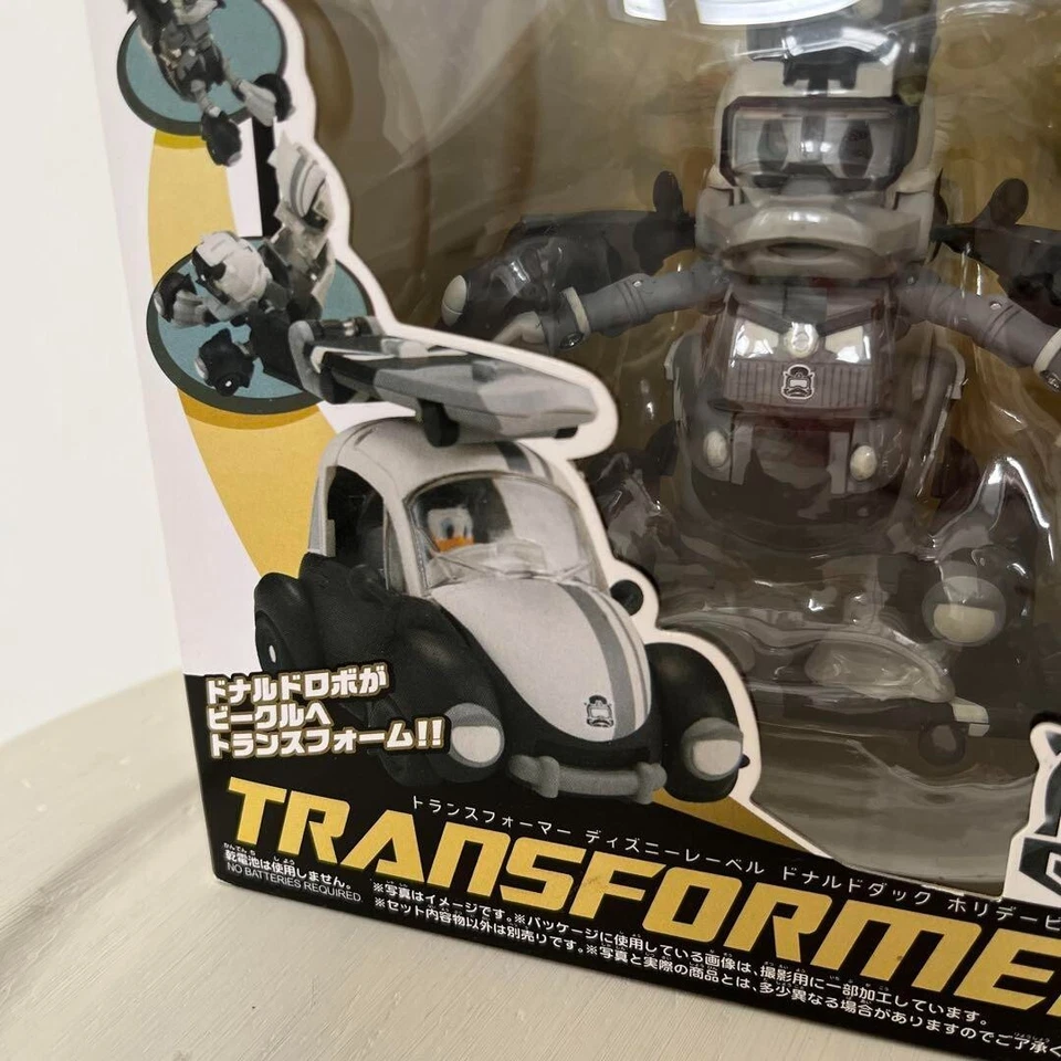 TAKARA Transformers Etiqueta Disney Juguete Pato Donald Vehículo de Vacaciones Monocromo Foto 2 de 4