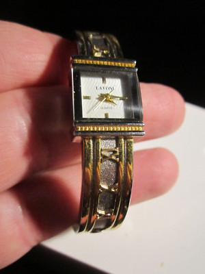 VINTAGE LAVONI WATCH ROMAN NUMERALS ON BAND - FITS TO 7'' WRIST - AG