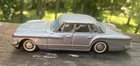 Vintage 1961 BANDAI Japan Plymouth Valiant 8.5" Friction Tin Toy Car silver