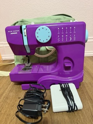 Janome Fuscia Pink Sewing Machine 10 Stitch Model 525B Used In Great Condition