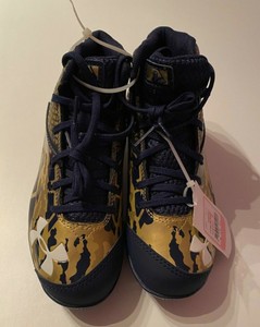 gold youth baseball cleats