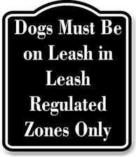 Dogs Must Be on Leash in Regulated Zones Only BLACK Aluminum Composite Sign