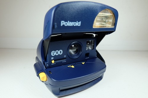 old vintage polaroid 600 blue instant film camera