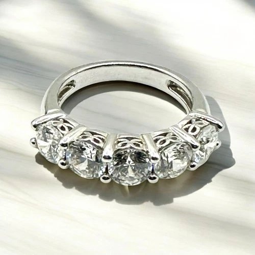 sterling silver five CZ stones band-size 7