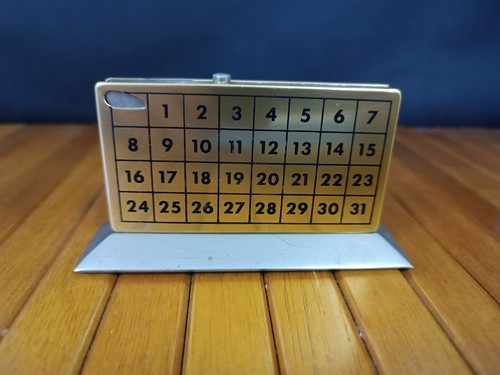 RARE VINTAGE TABLE LIGHTER WITH MONTHLY CALENDAR