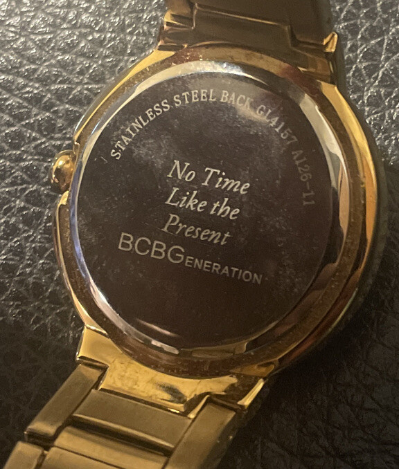 Women's BCBGeneration Gold Tone BCBG Watch some worn scraps on bracelet View 5