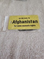 Inventive Travelware Yellow Luggage Tag " On My Way To Afghanistan.." box 280
