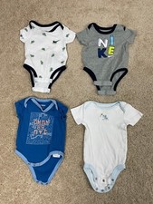 Lot of 4 Nike DKNY First Moments Toddler 0-3M...