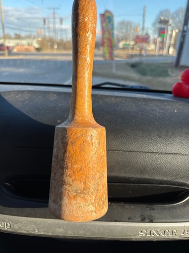 primiti antique wood hand tool for mashing potatoes are mashing