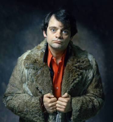 English actor David Jason posed wearing a fur coat over a dark lea- Old Photo
