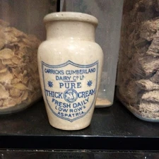 antique stoneware carricks  cumberland dairy, blue print cream pot. low row 