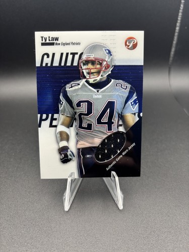 Parche de camiseta 2004 CP-TL Topps usado en juegos Ty Law Patriots usado en juegos MEM