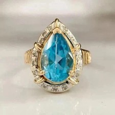 Lab Created Blue Topaz 2Ct Pear Cut Halo Engagement Ring 14K Yellow Gold Plated