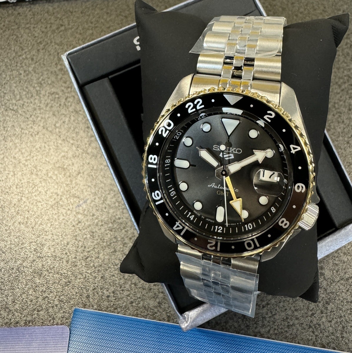 Seiko 5 Automatic GMT Steel Band Black Dial Gold Bezel Watch