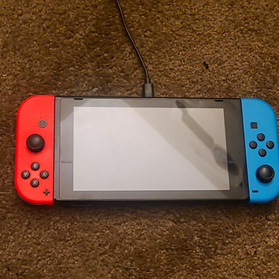 Nintendo Switch Handheld System Tablet Only w/ Neon Red/Blue Joy-Con