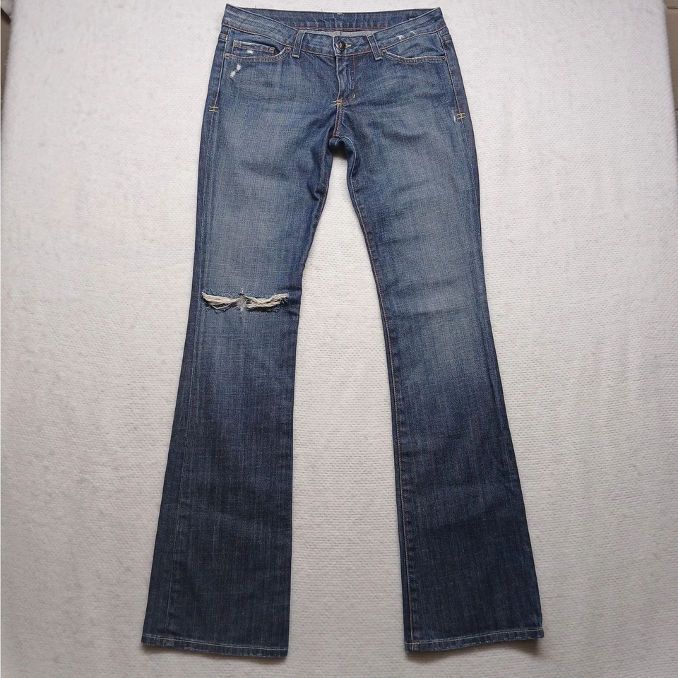 Pantalones de mezclilla para mujer People's Liberation Tanya Bootcut tiro bajo lavado medio Foto 2 de 4