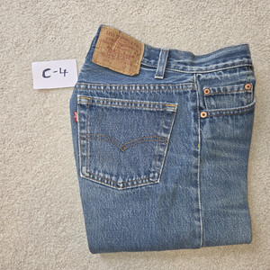 1989 Vintage Levis 501XX 28x36 Button Fly Jeans measures 26x31