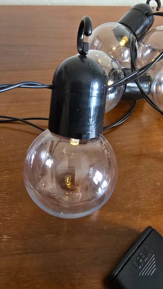 Guirnalda de luz de bola redonda 10 bombillas LED a batería para interiores Foto 3 de 4