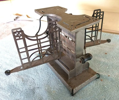 1920s UNIVERSAL DOUBLE SIDED ELECTRIC SKELETON TOASTER by LANDERS FRARY & CLARK