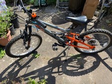 Apollo black and orange used kids bicycle in good condition 