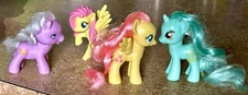 Lot of 4 ponies (My Little Pony) 2 Fluttershy, Lyra Heartstrings & 1 phony?