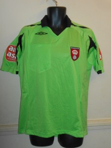 green referee shirt