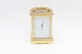 A Vintage French Brass Five Face Glass Garrard & Co Carriage Clock Working