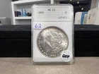 1885 Morgan Dollar in Old ANA Official Grade MS 63 Early Holder (ACJ)