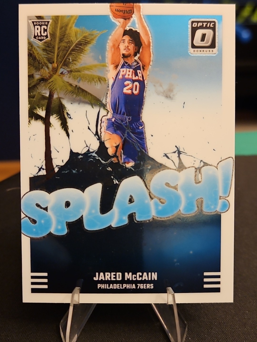 2024-25 Panini Donruss Optic - Splash! Jared McCain #3 (RC) Philadelphia 76ers